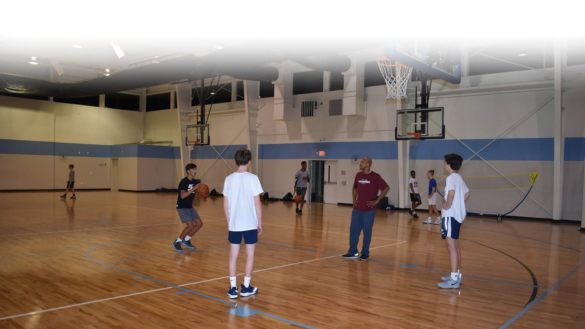Charlotte Basketball trainer teaching shooting